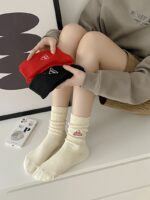 جوراب ساق‌دار اسپرت مدل لوگو مثلثی گلدوزی شده نخی زنانه و مردانه - تصویر 2